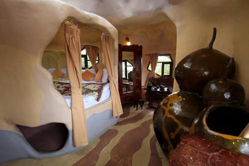 a bedroom with two beds in a play house at Crazy House in Da Lat