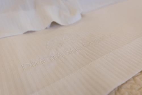 a piece of white paper with the word dundermontsson at Dimora San Quirico - bed e breakfast - Cisternino in Cisternino