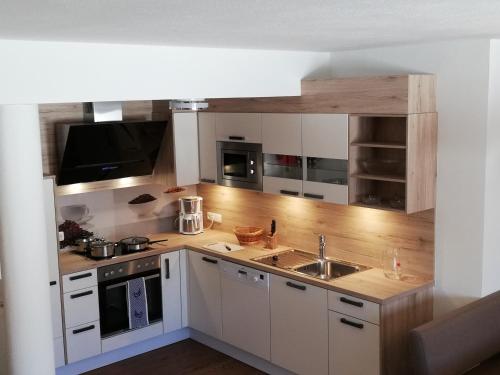 Kuchyň nebo kuchyňský kout v ubytování Ferienhaus Joel