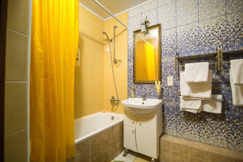Koupelna v ubytování Hotel London-Paris