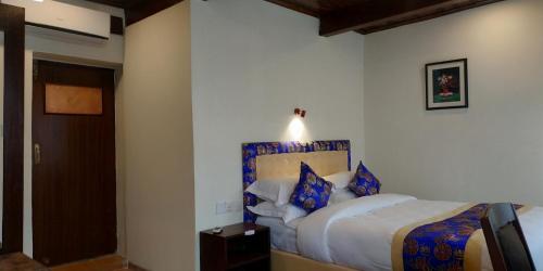 Cama o camas de una habitación en Heranya La:Ku