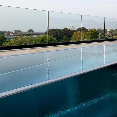 a tennis court on the roof of a building at Piranesi 246 in Milan
