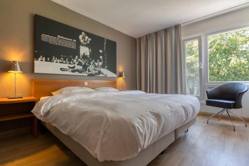 Postel nebo postele na pokoji v ubytování Fletcher Resort-Hotel Zutphen