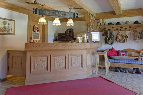 a store with a counter in a room at Das Landhaus in Pfronten