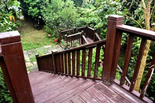 Jardín al aire libre en Yiyue Guanhe Homestay 倚月觀荷民宿