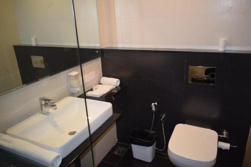 Koupelna v ubytování Starlit Suites Kochi