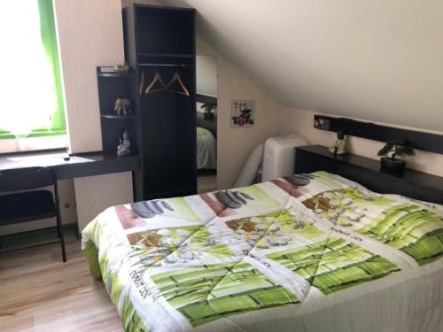 Postel nebo postele na pokoji v ubytování Hôtel Le Bambi