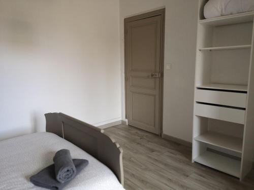 Una cama o camas en una habitación de Appartement du GET