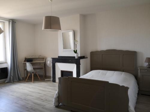 Postel nebo postele na pokoji v ubytování Appartement du GET