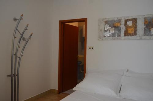 Ένα ή περισσότερα κρεβάτια σε δωμάτιο στο Apartman Roguljić