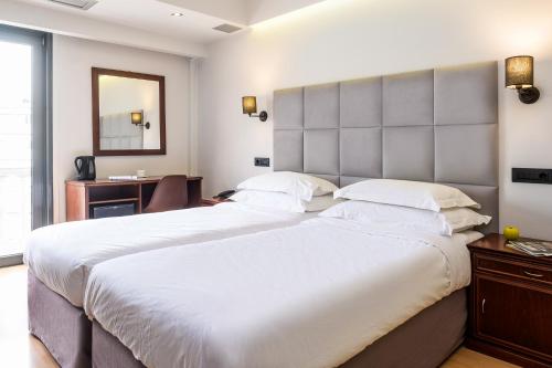 Katil atau katil-katil dalam bilik di Athens Odeon Hotel