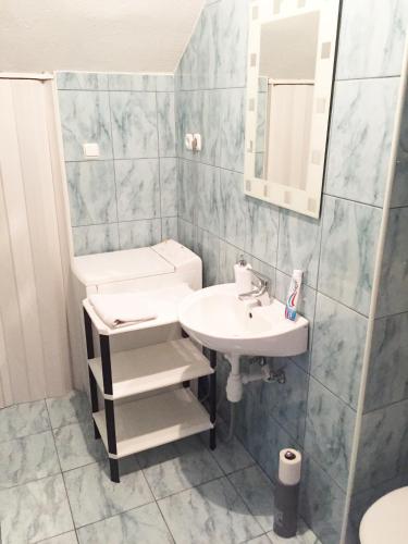 Et badeværelse på Apartman Marina
