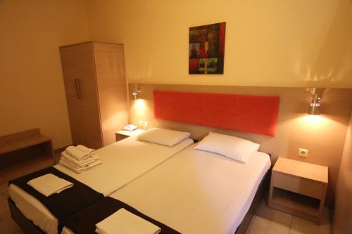 Katil atau katil-katil dalam bilik di Philoxenia Hotel & Studios
