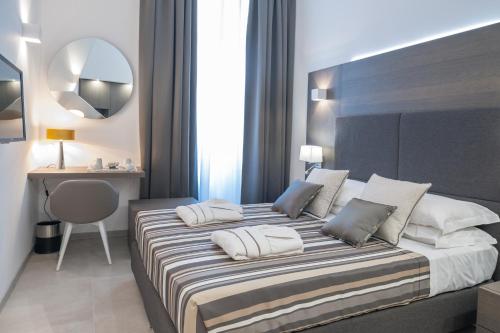 Posteľ alebo postele v izbe v ubytovaní Wellness Home Rome