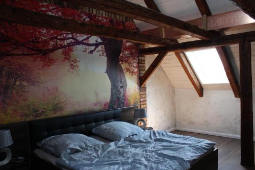 Ferienwohnung auf dem Bauernhof tesisinde bir odada yatak veya yataklar