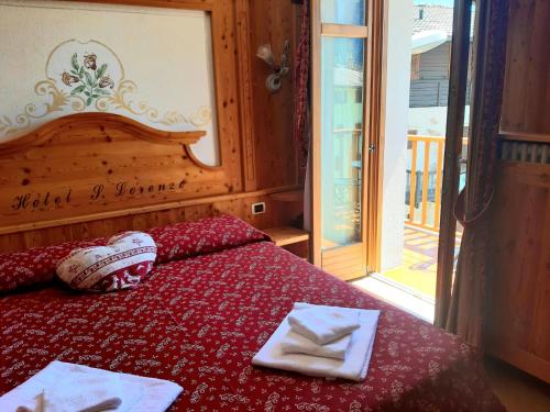 Letto o letti in una camera di Hotel San Lorenzo