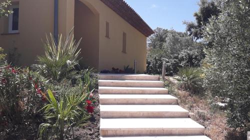 a set of stairs leading to a house at La Villa Provençale in Lorgues