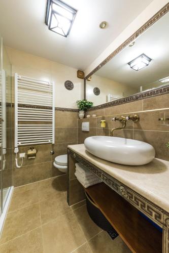 Salle de bains dans l'établissement Apartment Ave Caesar