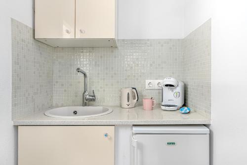 Η κουζίνα ή μικρή κουζίνα στο Central Suites Mykonos