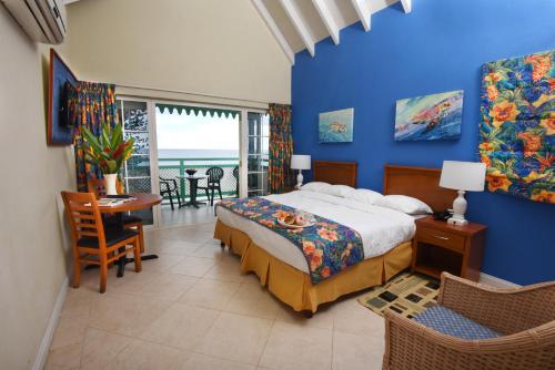 Postel nebo postele na pokoji v ubytování Blue Orchids Beach Hotel