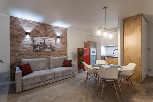 A seating area at B&W Luxurious Apartment in the center of Wroclaw