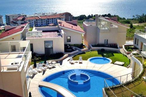 an aerial view of a house with a swimming pool at Exclusive Big Villa in Byala