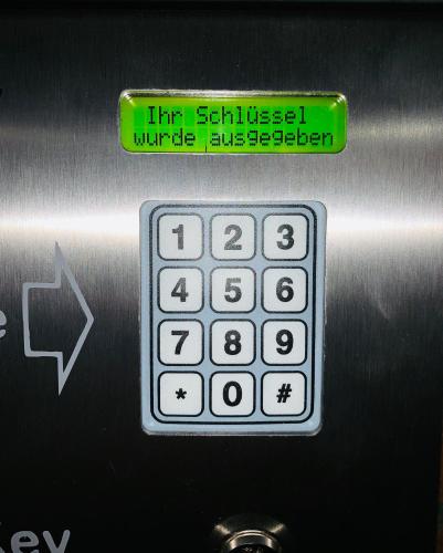 a close up of a calculator on a machine at smart&beautiful Guesthouse in Nordkirchen