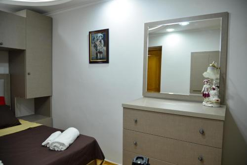 Postel nebo postele na pokoji v ubytování Anastasia Apartment