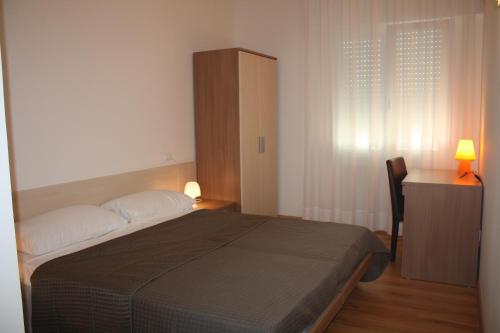 Postel nebo postele na pokoji v ubytování Hotel Gronda Lagunare