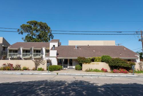 a house on the corner of a street at Cannery Row Inn in Monterey
