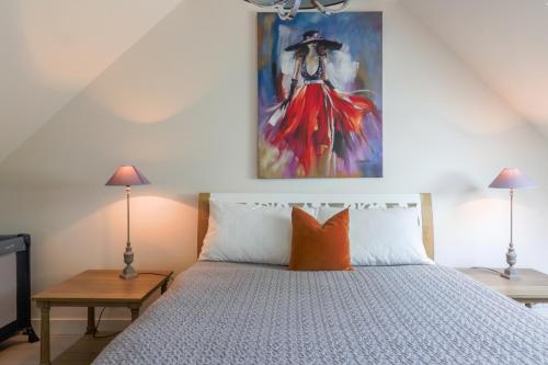 Ένα ή περισσότερα κρεβάτια σε δωμάτιο στο La Caillère