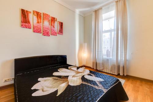 Katil atau katil-katil dalam bilik di Apartment on Griboyedova 38