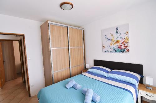 Katil atau katil-katil dalam bilik di Apartment Neven