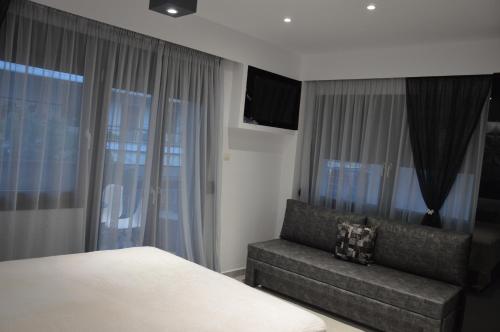 Ένα ή περισσότερα κρεβάτια σε δωμάτιο στο S. Luxury Princess Suite