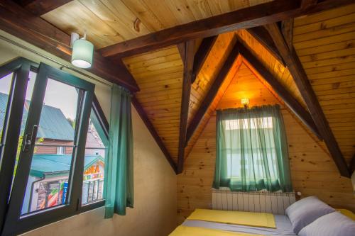 Postelja oz. postelje v sobi nastanitve Apartmani Restoran Durmitor