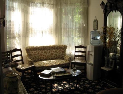 a living room with a couch and a table at Wayne on Main in Honesdale