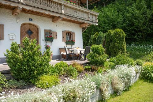 Jardín al aire libre en Apartment Landhaus Mühlau in Tirol
