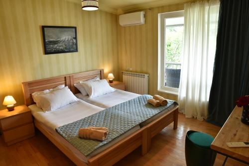 Postel nebo postele na pokoji v ubytování 4BD Appartaments with cozy garden