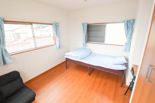 A bed or beds in a room at Saitama Niiza House / Vacation STAY 4274