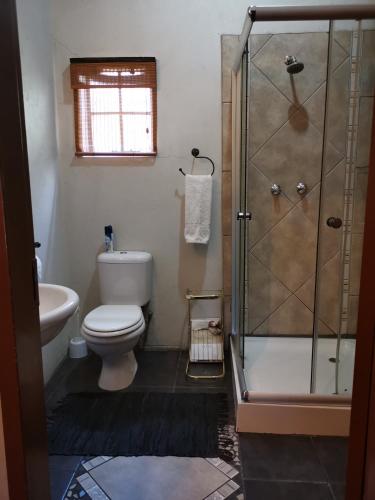 Bilik mandi di Bastille de Blignaut B&B