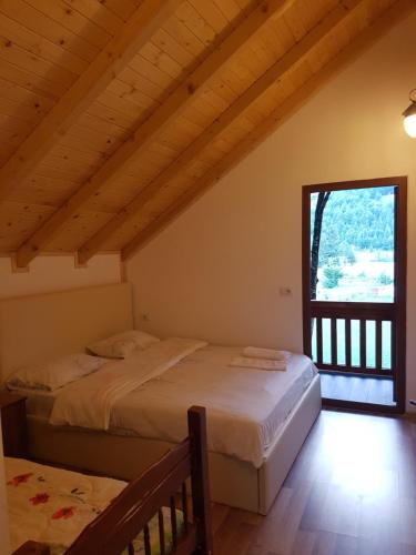 Cama o camas de una habitación en Krojet e Rrogamit