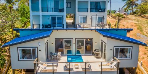 an aerial view of a house with a pool at Villa Topaz Above West Bay with 360 Degree Views! in West Bay