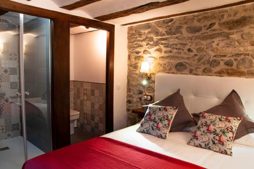 Un pat sau paturi într-o cameră la Casa Piñana
