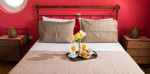 Ένα ή περισσότερα κρεβάτια σε δωμάτιο στο Villa Olympia VIP