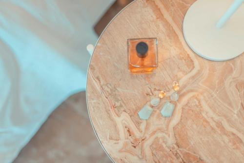 a close up of a table with a glass top at B&B Teatro Greco 39 in Taormina