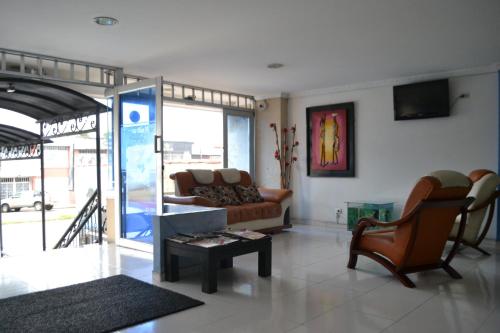 Χώρος καθιστικού στο Diamante Blue Hotel