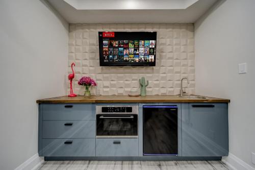 a kitchen with a counter and an oven at The Westlake in Toronto