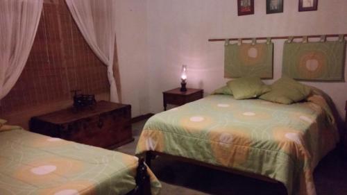 Ένα ή περισσότερα κρεβάτια σε δωμάτιο στο Hotel Las Aldas