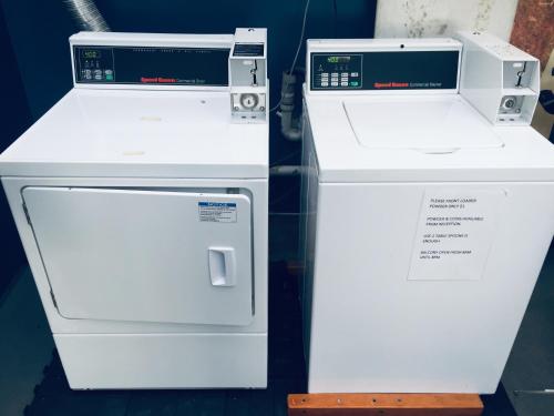 two machines are sitting next to each other at Coogee Beach House in Sydney