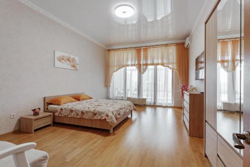 Postel nebo postele na pokoji v ubytování Arcadijskiy Palace